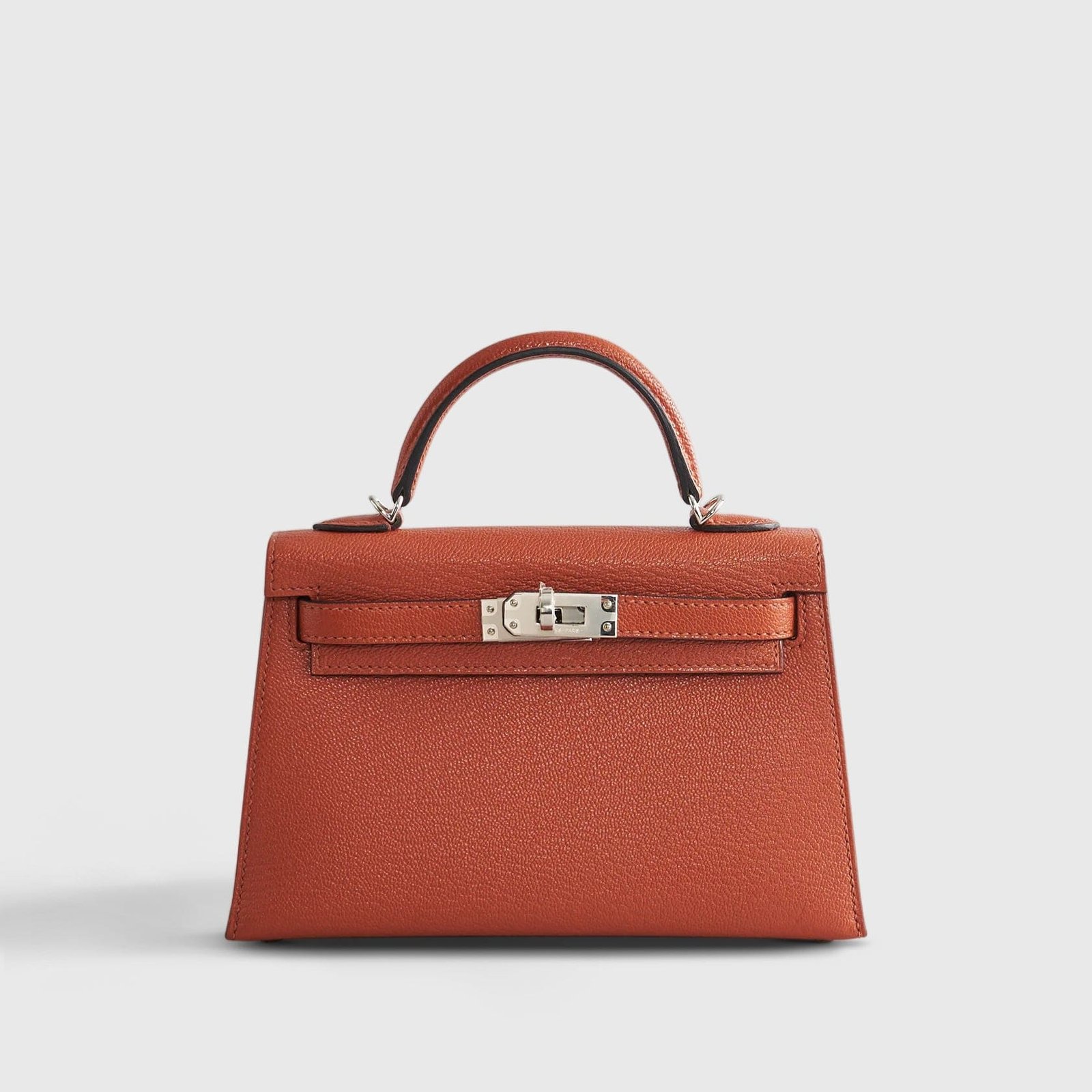 176HermesKellyMiniChevreCuivre_RoseMexicow_WoolStrapPalladiumHardware.jpg Hermès Kelly Mini Bag - Image 1