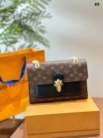 Louis Vuitton Victoire Handbag Monogram Canvas and Leather - Image 2