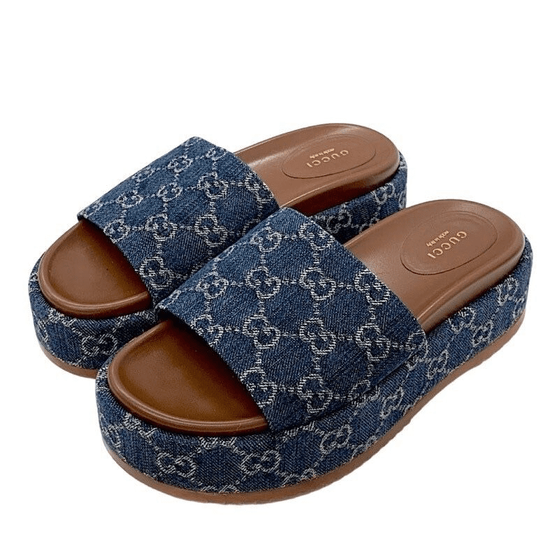 ad1430882958e4a87b8242e7bed678bc.png Gucci Women’s platform slide sandal - Image 1